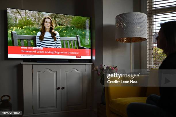 Relative of the photographer watches television, as Catherine, The Princess of Wales announces that she is receiving a preventative course of...