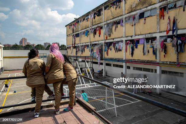 Inmates look at a soccer game at El Buen Pastor women's prison, in Bogota on February 26, 2024. The Colombian Ministry of Justice estimates that 37%...