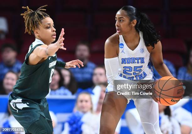 DeeDee Hagemann of the Michigan State Spartans defends Deja Kelly of the North Carolina Tar Heels during the first round of the 2024 NCAA Women's...