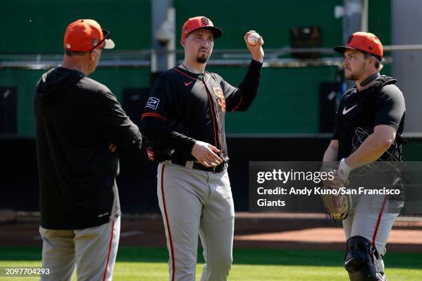 Blake Snell and Patrick Bailey of the San Francisco Giants talk after a bullpen session at Scottsdale Stadium on March 21, 2024 in San Francisco,...