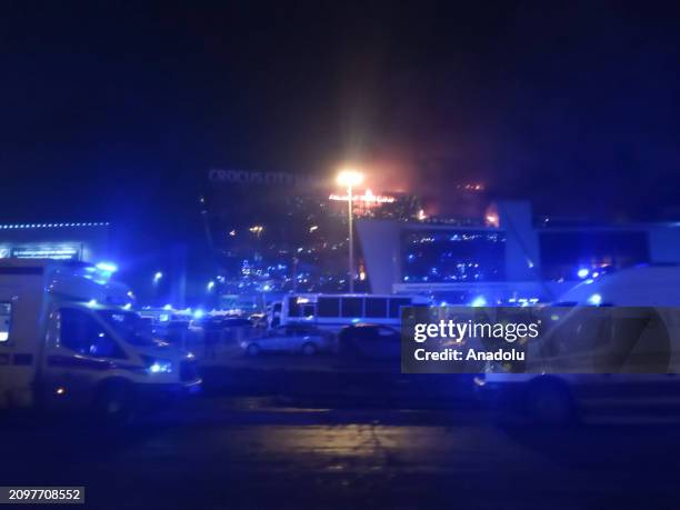 Ambulances, personnel arrive at Crocus City Hall concert venue near Moscow, Russia after reports of a shooting incident on March 22, 2024. Several...