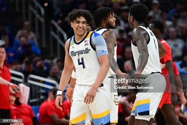 Stevie Mitchell of the Marquette Golden Eagles reacts during the first round of the 2024 NCAA Men's Basketball Tournament held at Gainbridge...