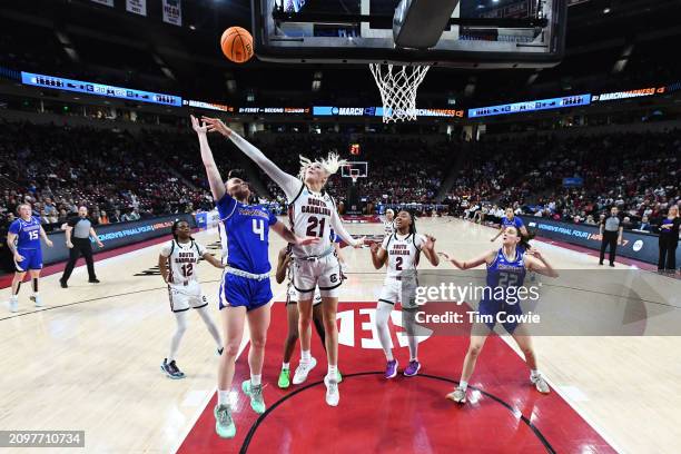 Chloe Kitts of the South Carolina Gamecocks attempts to block the shot of Tilda Sjokvist of the Presbyterian Blue Hose during the first round of the...