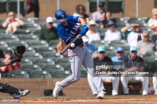 Matt Duffy of the Texas Rangers bats during a spring training game against the Arizona Diamondbacks at Salt River Fields on February 27, 2024 in...