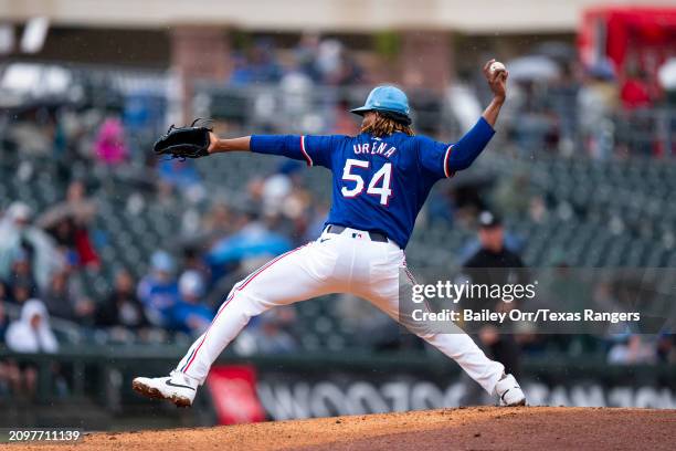 Jose Urena of the Texas Rangers pitches during a spring training game against the Arizona Diamondbacks at Surprise Stadium on March 07, 2024 in...