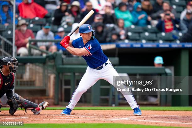 Wyatt Langford of the Texas Rangers bats during a spring training game against the Arizona Diamondbacks at Surprise Stadium on March 07, 2024 in...