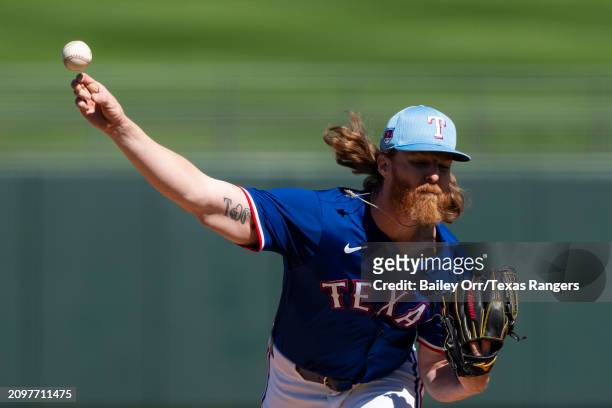 Jon Gray of the Texas Rangers pitches during a spring training game against the Chicago White Sox at Surprise Stadium on March 02, 2024 in Surprise,...