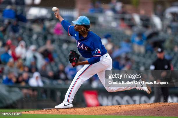 Jose Urena of the Texas Rangers pitches during a spring training game against the Arizona Diamondbacks at Surprise Stadium on March 07, 2024 in...