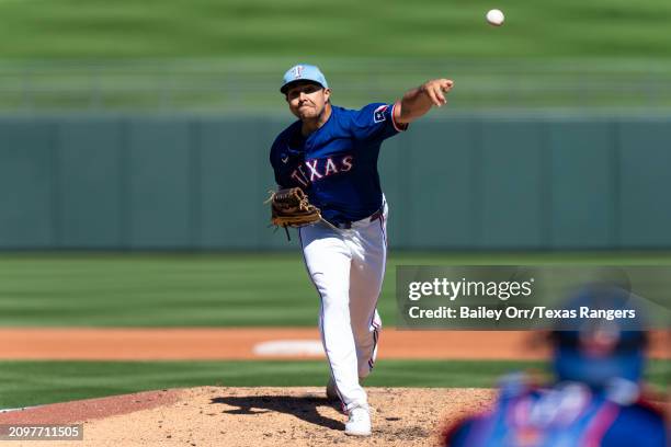 Brock Burke of the Texas Rangers pitches during a spring training game against the Chicago White Sox at Surprise Stadium on March 02, 2024 in...