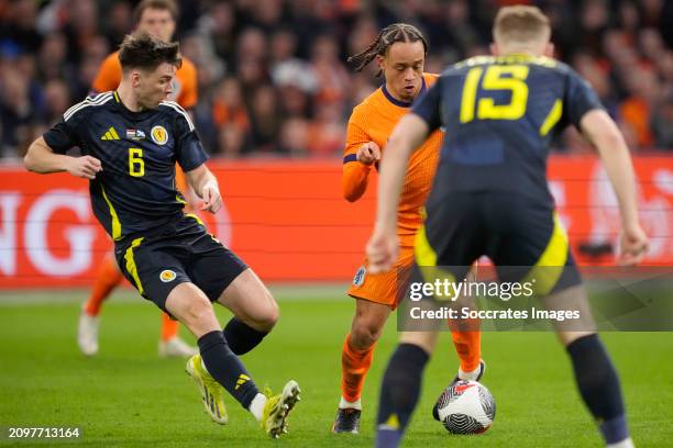 Kieran Tierney of Scotland, Xavi Simons of Holland during the International Friendly match between Holland v Scotland at the Johan Cruijff Arena on...