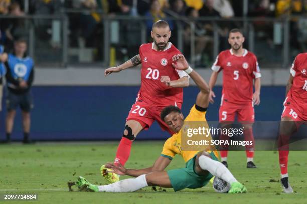 Ali Tneich , Nassar Nassar of Lebanon football team and Kusini Yengi of Australia football team seen in action during the FIFA World Cup 2026...