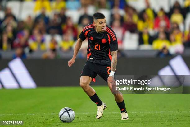 Daniel Muñoz of Colombia controls the ball during the international friendly match between Spain and Colombia at London Stadium on March 22, 2024 in...