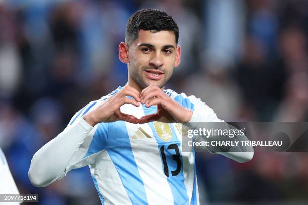 Argentina's defender Cristian Romero celebrates after scoring a goal during the international friendly football match between El Salvador and...
