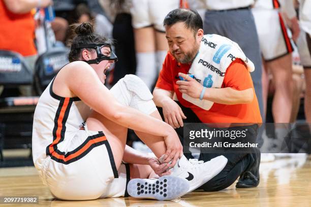 Forward Raegan Beers of the Oregon State Beavers reacts after going down at the end of the third quarter against the Eastern Washington Eagles during...