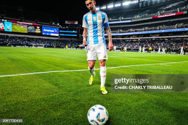 Argentina's forward Angel Di Maria walks towards the ball during the international friendly football match between El Salvador and Argentina at...