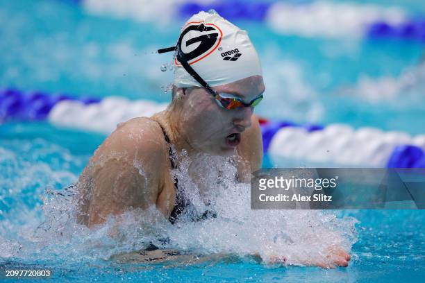 Zoie Hartman of the Georgia Bulldogs competes in the Women's 400 Yard Relay consolation finals during the Division I Women's Swimming and Diving...