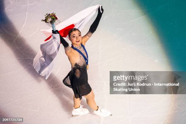 Gold medal winner Kaori Sakamoto of Japan pose with medal and flag during medal ceremony during the ISU World Figure Skating Championships at Bell...