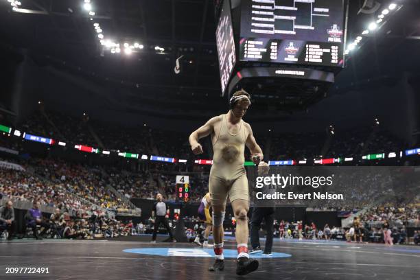 Benjamin Pasiuk of the Army West Point Black Knights wrestles Jared Simma of the University of Northern Iowa Panthers during the Division I Men's...