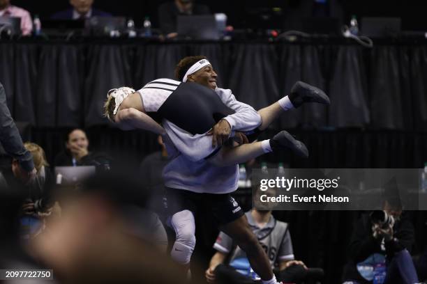 Evan Frost of the Iowa State University Cyclones wrestles Kai Orine of the North Carolina State University Wolfpack during the Division I Men's...