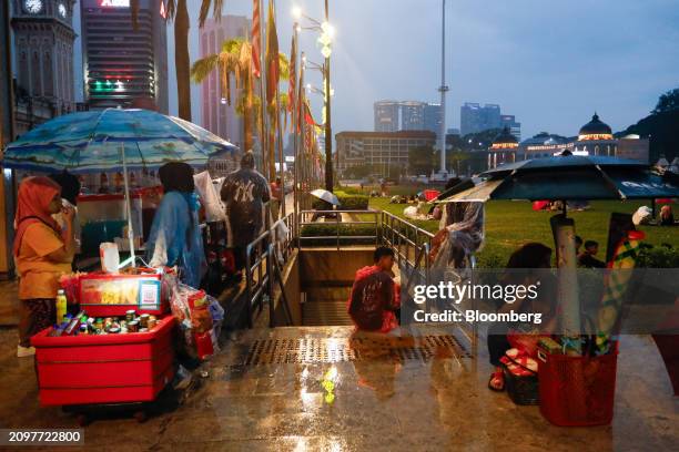 Vendor sells drinks near the in Kuala Lumpur, Malaysia, on Friday, March 22, 2024. Malaysia is expected to release CPI figures on March 25....