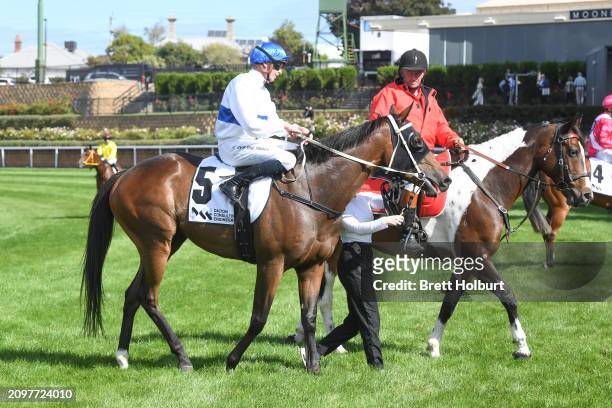 Michael Dee returns to the mounting yard on Antrim Coast after winning the DCE Alister Clark Stakes at Moonee Valley Racecourse on March 23, 2024 in...