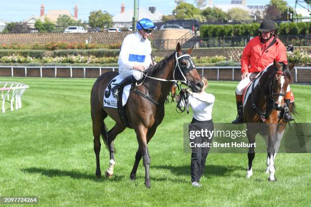 Michael Dee returns to the mounting yard on Antrim Coast after winning the DCE Alister Clark Stakes at Moonee Valley Racecourse on March 23, 2024 in...