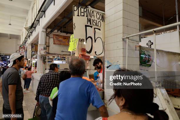 Chickens are for sale at a market in Mexico City. Recently, the Ministry of Health of Tlaxcala, Mexico, issued an epidemiological alert due to an...