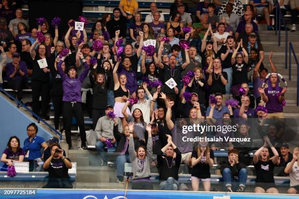 Fans of the Kenyon Owls cheer on during the Division III Men's and Women's Swimming and Diving Championships held at Greensboro Aquatic Center on...