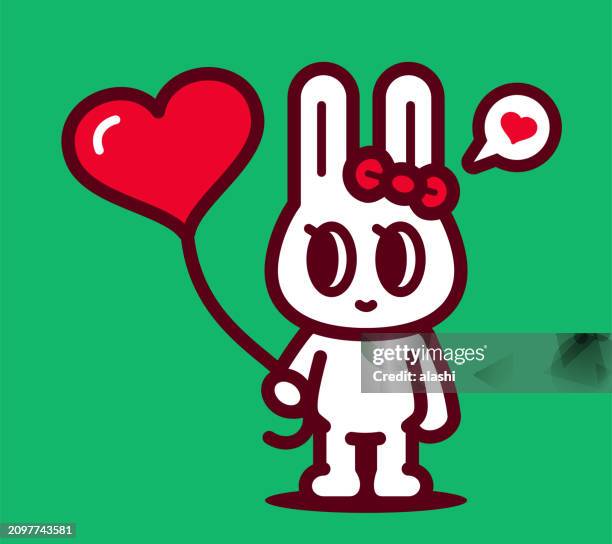 a cute bunny holds a love heart-shaped balloon - world kindness day stock-grafiken, -clipart, -cartoons und -symbole