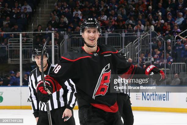 Martin Necas of the Carolina Hurricanes celebrates his goal at 19:59 of the first period against the New York Islanders at UBS Arena on March 19,...
