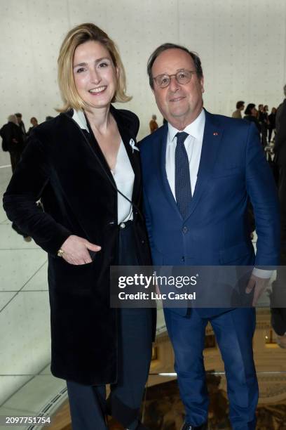 Julie Gayet and Francois Hollande attend the Opening of the Exhibition Le Monde Comme Il Va at Bourse De Commerce Pinault Collection on March 19,...