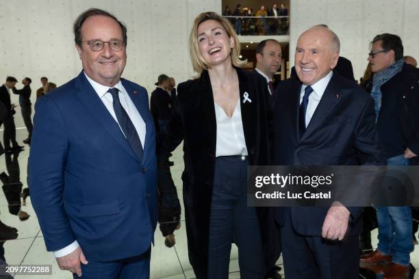 Francois Hollande, Julie Gayet and Francois Pinault attend the Opening of the Exhibition Le Monde Comme Il Va Exhibition at Bourse De Commerce...