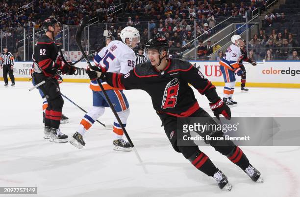 Martin Necas of the Carolina Hurricanes celebrates his goal at 19:59 of the first period against the New York Islanders at UBS Arena on March 19,...