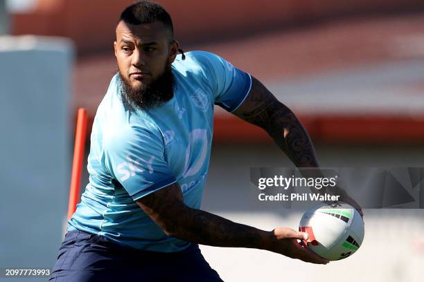 Addin Fonua-Blake passes during a New Zealand Warriors NRL training session at Mt Smart Stadium on March 20, 2024 in Auckland, New Zealand.