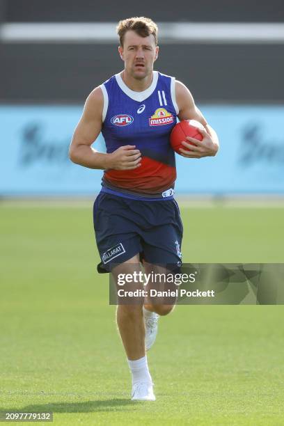 Jack Macrae of the Bulldogs in action during a Western Bulldogs AFL training session at Whitten Oval on March 20, 2024 in Melbourne, Australia.