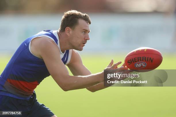 Jack Macrae of the Bulldogs in action during a Western Bulldogs AFL training session at Whitten Oval on March 20, 2024 in Melbourne, Australia.