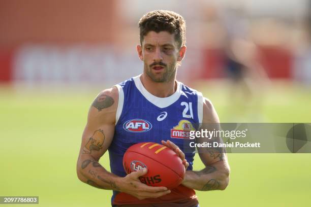 Tom Liberatore of the Bulldogs in action during a Western Bulldogs AFL training session at Whitten Oval on March 20, 2024 in Melbourne, Australia.