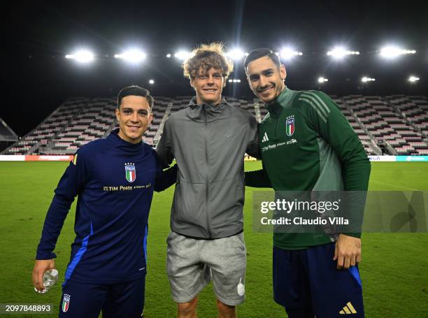 Giacomo Raspadori and Alex Meret of Italy and 2024 Australian Open tennis winner, Jannik Sinner attend a training session at Chase Stadium on March...