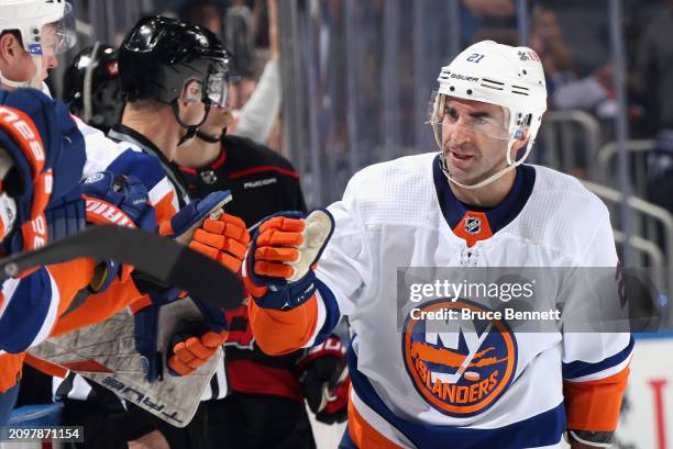 Kyle Palmieri of the New York Islanders celebrates a third period goal against the Carolina Hurricanes at UBS Arena on March 19, 2024 in Elmont, New...