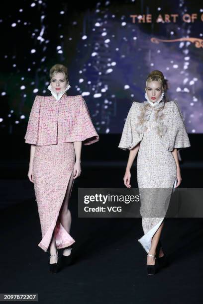 Models walk the catwalk for the Hu Sheguang Collection show during Beijing Fashion Week AW2024 on March 19, 2024 in Beijing, China.