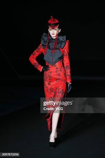 Model walks the catwalk for the Hu Sheguang Collection show during Beijing Fashion Week AW2024 on March 19, 2024 in Beijing, China.