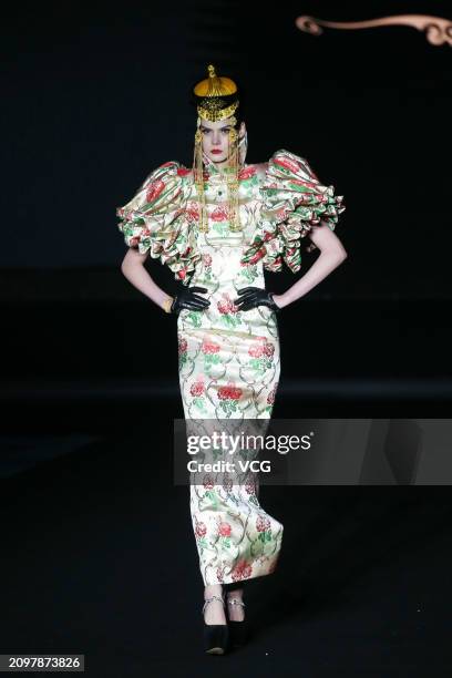 Model walks the catwalk for the Hu Sheguang Collection show during Beijing Fashion Week AW2024 on March 19, 2024 in Beijing, China.