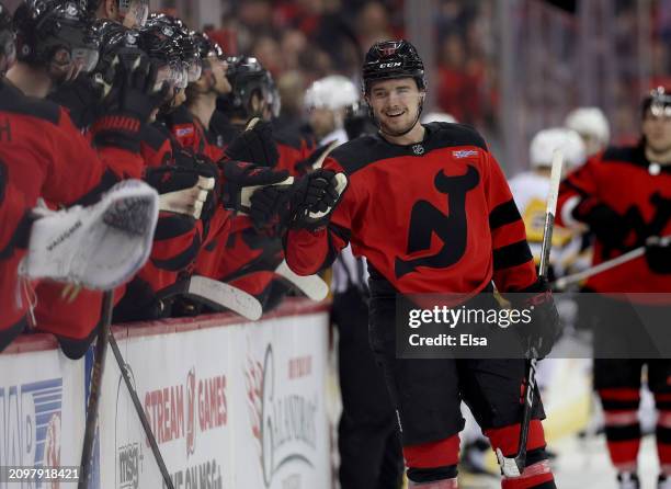 Alexander Holtz of the New Jersey Devils celebrates his goal during the third period against the Pittsburgh Penguins at Prudential Center on March...