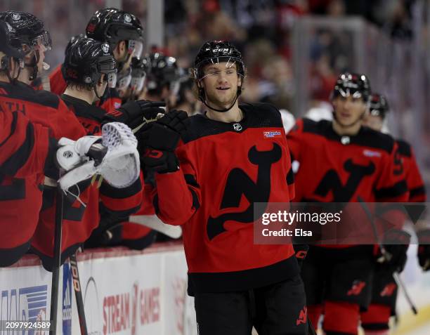 Dawson Mercer of the New Jersey Devils celebrates his goal during the third period against the Pittsburgh Penguins at Prudential Center on March 19,...