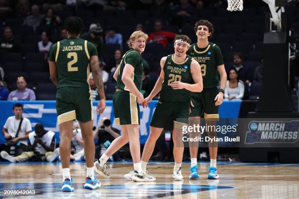 Joe Palmer of the Colorado State Rams celebrates with teammates during the second half against the Virginia Cavaliers in the First Four game during...