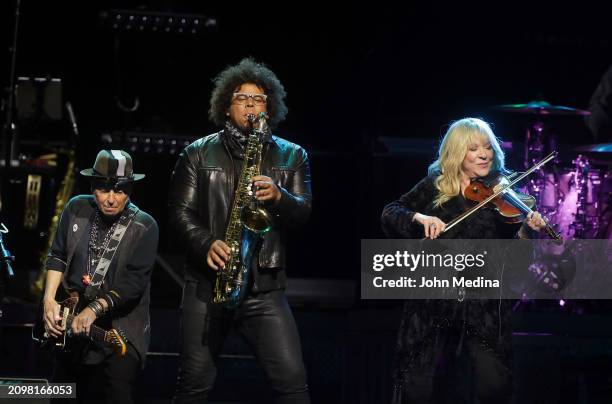 Nils Lofgren, Jake Clemons and Soozie Tyrell perform at Footprint Center on March 19, 2024 in Phoenix, Arizona.