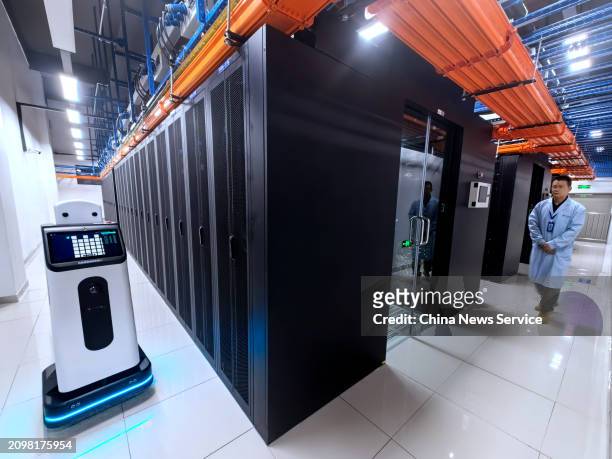 Robot inspects servers at the China Telecom Digital Qinghai Green Big Data Center, China's the first zero-carbon data center, on March 19, 2024 in...