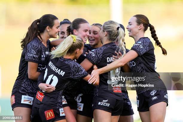 Kate Taylor of the Phoenix celebrates with teammatesafter scoring a goal during the A-League Women round 16 match between Wellington Phoenix and...