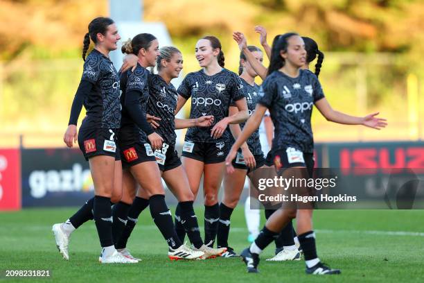 Michaela Foster of the Phoenix celebrates with teammates after scoring a goal during the A-League Women round 16 match between Wellington Phoenix and...