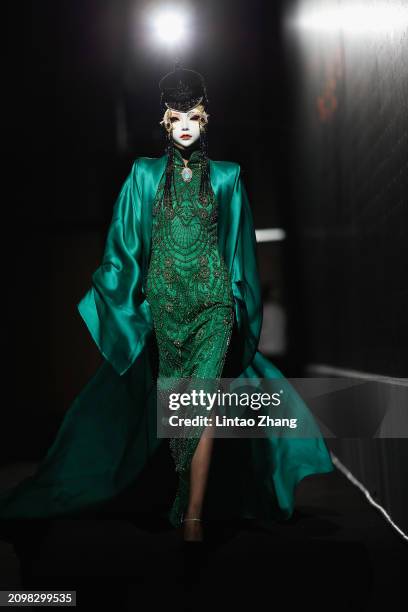 Model walks the runway during the dress rehearsal before Sheguang Hu Collection show at the Beijing Fashion Week AW2024 on March 19, 2024 in Beijing,...